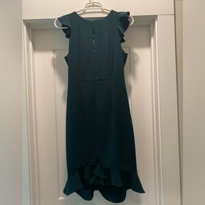 Worn once, great condition. Fitted mini dress with a slight high-low.
